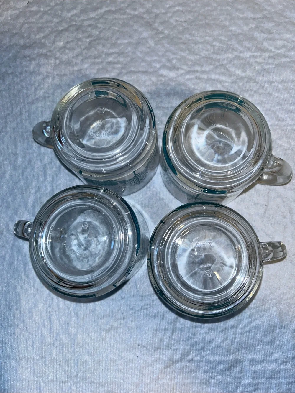 Set of 4Anchor Hocking clear glass coffee mugs featuring a blue-and-white winter